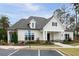 Charming community clubhouse with stone accents, white siding, and well-manicured landscaping at 4902 Pleasantry Way, Acworth, GA 30101