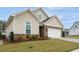 Charming home with stone accents, a two-car garage, and well-maintained lawn and landscaping at 4902 Pleasantry Way, Acworth, GA 30101