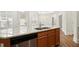 Kitchen island with stainless steel dishwasher and view to porch and dinning area at 4902 Pleasantry Way, Acworth, GA 30101