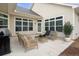 Covered patio with contemporary furniture, a grill, and a view of the manicured backyard at 4902 Pleasantry Way, Acworth, GA 30101