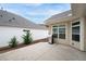 Covered patio with a stainless steel grill and view of the adjacent building at 4902 Pleasantry Way, Acworth, GA 30101