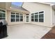 Covered patio featuring a grill and providing access to the lush backyard at 4902 Pleasantry Way, Acworth, GA 30101