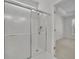 Modern bathroom featuring a glass-enclosed shower at 6560 Waveland Dr, Cumming, GA 30040
