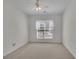 Bedroom with a large window that let in lots of natural light at 6560 Waveland Dr, Cumming, GA 30040