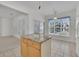 Kitchen island with eat-in space at 6560 Waveland Dr, Cumming, GA 30040