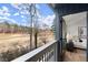 Balcony with beautiful view from bedroom with French doors at 8700 Mount Rushmore Dr, Alpharetta, GA 30022