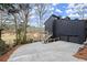 Contemporary home with a private driveway, two-car garage and direct access to the golf course at 8700 Mount Rushmore Dr, Alpharetta, GA 30022