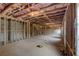 A basement that is unfinished features insulation, concrete floors, and natural light at 3870 Ivy Cottage Dr, Snellville, GA 30039