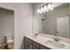 Modern bathroom with dual sinks, gray cabinetry, and large mirror at 3870 Ivy Cottage Dr, Snellville, GA 30039