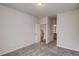 Bedroom with carpet, featuring white walls and bright natural light streaming through windows at 3870 Ivy Cottage Dr, Snellville, GA 30039