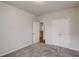 Bright bedroom with gray carpet features a large closet and natural light at 3870 Ivy Cottage Dr, Snellville, GA 30039