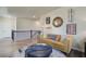 Upstairs bonus room with stylish decor, comfortable seating, and natural light at 3870 Ivy Cottage Dr, Snellville, GA 30039