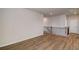 Spacious upstairs hallway with wood flooring and black metal railing at 3870 Ivy Cottage Dr, Snellville, GA 30039