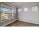 Bright living room featuring large windows and beautiful wood floors at 3870 Ivy Cottage Dr, Snellville, GA 30039