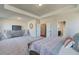 Large main bedroom features neutral walls, ensuite bathroom, and a sitting area at 3870 Ivy Cottage Dr, Snellville, GA 30039