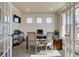 Home office featuring French doors, modern decor and plenty of natural light at 3870 Ivy Cottage Dr, Snellville, GA 30039