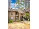 Charming townhome featuring a welcoming entryway and a well-maintained exterior with fresh neutral paint scheme at 8740 Roswell Rd # 5G, Sandy Springs, GA 30350