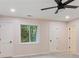 Bedroom featuring carpet, a ceiling fan, and natural light from the window at 95 Lakeshore Ne Cir, Marietta, GA 30067