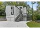 Beautiful home exterior with a large driveway and lovely landscaping at 95 Lakeshore Ne Cir, Marietta, GA 30067