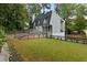 Side view of home with well-kept yard and landscaping at 95 Lakeshore Ne Cir, Marietta, GA 30067
