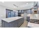 Modern kitchen with white countertops, stainless steel appliances, island with barstool seating at 95 Lakeshore Ne Cir, Marietta, GA 30067