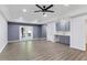 Spacious living room with recessed lighting, gray cabinets, gray walls, and access to backyard at 95 Lakeshore Ne Cir, Marietta, GA 30067