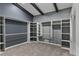 Walk-in closet with gray walls and white built-in shelving at 95 Lakeshore Ne Cir, Marietta, GA 30067