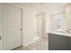 Bathroom featuring a walk-in shower, tub and vanity with sink at 288 Highgrove Way, Dallas, GA 30157