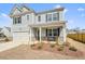 Charming two-story home featuring a welcoming front porch and a well-manicured lawn at 288 Highgrove Way, Dallas, GA 30157