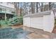 This detached garage is situated near the covered pool and green deck at 3780 Clubview Se Ct, Conyers, GA 30094