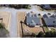 An aerial view of the backyard of a home showing its landscaping and the surrounding neighborhood at 942 Fairmont Park Dr, Dacula, GA 30019