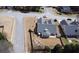 Aerial view of a home, showcasing the backyard with patio and landscaping within a residential neighborhood at 942 Fairmont Park Dr, Dacula, GA 30019