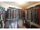 Walk-in closet with abundant hanging space and organization at 942 Fairmont Park Dr, Dacula, GA 30019