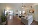 Inviting living room featuring hardwood floors, a fireplace, and views to the kitchen and dining area at 942 Fairmont Park Dr, Dacula, GA 30019