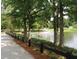 Lenora Park pond with a fountain and trees at 4604 Eastbrook Pl, Snellville, GA 30039