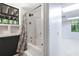 Bathroom featuring a shower/tub combo and dark accent wall at 6464 Westerly Way, Douglasville, GA 30135