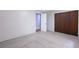 Bedroom featuring neutral paint, carpet, and a closet at 6464 Westerly Way, Douglasville, GA 30135