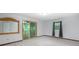 Bedroom featuring neutral carpet, sliding door to the screened-in back porch at 6464 Westerly Way, Douglasville, GA 30135