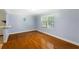 Light-filled dining space featuring hardwood floors, and a view to the backyard at 6464 Westerly Way, Douglasville, GA 30135