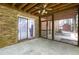 View of screened in porch with brick accents at 6464 Westerly Way, Douglasville, GA 30135