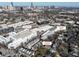 Aerial view of a mixed-use development featuring apartments, retail spaces and commercial buildings in an urban environment at 77 Krog Ne St, Atlanta, GA 30307