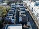 An aerial view showing a community of modern townhomes with private rooftop decks and balconies at 77 Krog Ne St, Atlanta, GA 30307