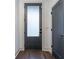 Interior view of a modern front door with privacy glass, leading into a stylish home at 77 Krog Ne St, Atlanta, GA 30307