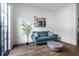 Cozy sitting room with bright window and hardwood floors at 77 Krog Ne St, Atlanta, GA 30307