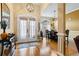 Inviting foyer with hardwood floors leads to the dining area and living space at 9620 Coastal Pointe Dr, Villa Rica, GA 30180