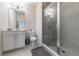 Modern bathroom features glass enclosed shower, vanity with sink, and neutral colors at 112 Calder Dr, Alpharetta, GA 30009