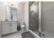 Modern bathroom includes a glass shower and a single vanity with modern fixtures at 112 Calder Dr, Alpharetta, GA 30009
