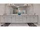 Spacious bathroom featuring a double sink vanity and large mirror at 112 Calder Dr, Alpharetta, GA 30009