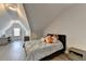 Charming bedroom with a bed, a desk, and plenty of natural light from the window at 112 Calder Dr, Alpharetta, GA 30009