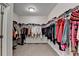 Walk-in closet with lots of storage, and an open doorway at 112 Calder Dr, Alpharetta, GA 30009